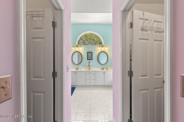 388 Lolly Ln, Saint Johns, FL 32259 - corridor featuring a sink