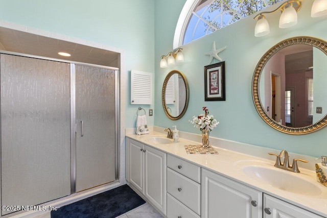 388 Lolly Ln, Saint Johns, FL 32259 - full bathroom with a sink, tile patterned flooring, a stall shower, and double vanity