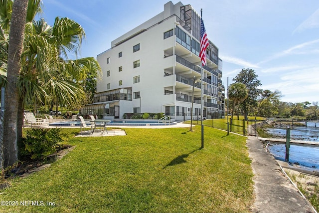 2280 Shepard St Unit 603, Jacksonville, FL 32211 - exterior space with fence, a pool, and a yard