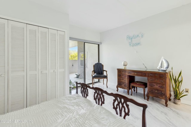 2280 Shepard St Unit 603, Jacksonville, FL 32211 - bedroom featuring baseboards and two closets