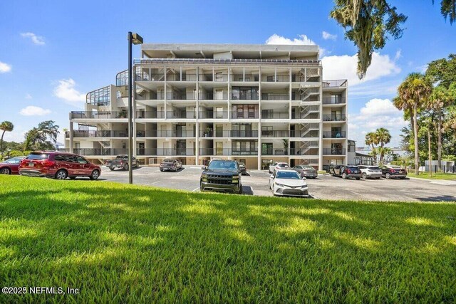 2280 Shepard St Unit 603, Jacksonville, FL 32211 - view of property with uncovered parking