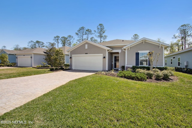 281 Tintamarre Dr, Saint Augustine, FL 32092 - ranch-style house with driveway, a garage, and a front lawn