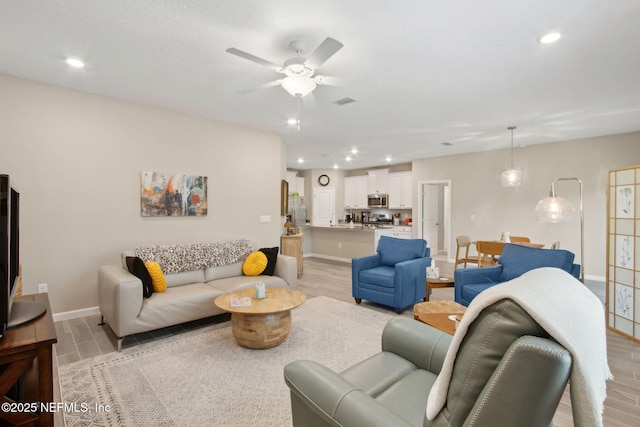 281 Tintamarre Dr, Saint Augustine, FL 32092 - living area featuring visible vents, baseboards, ceiling fan, recessed lighting, and light wood-style floors