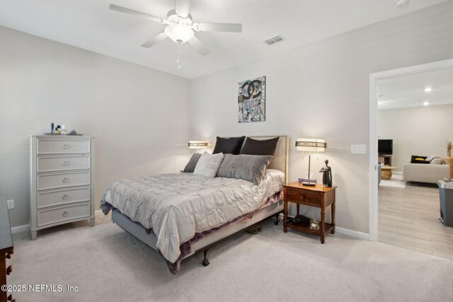 281 Tintamarre Dr, Saint Augustine, FL 32092 - bedroom with baseboards, ceiling fan, and light carpet