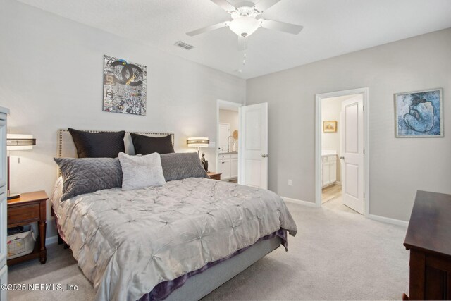 281 Tintamarre Dr, Saint Augustine, FL 32092 - bedroom featuring connected bathroom, a ceiling fan, light carpet, baseboards, and visible vents