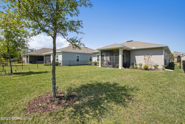 281 Tintamarre Dr, Saint Augustine, FL 32092 - rear view of property featuring a fenced backyard, a sunroom, and a yard