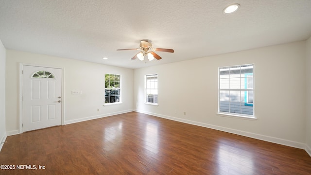3251 Ernest St, Jacksonville, FL 32205 - interior space featuring a ceiling fan, a textured ceiling, and wood finished floors