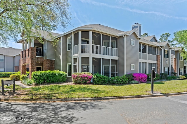 view of building exterior with a residential view