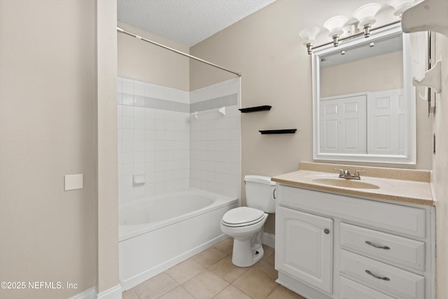 full bathroom with toilet, vanity, washtub / shower combination, a textured ceiling, and tile patterned flooring