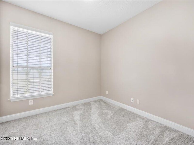 4442 Capital Dome Dr, Jacksonville, FL 32246 - carpeted empty room featuring baseboards