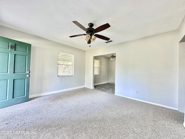 11920 Betula Rd, Jacksonville, FL 32246 - carpeted empty room with visible vents, baseboards, and ceiling fan