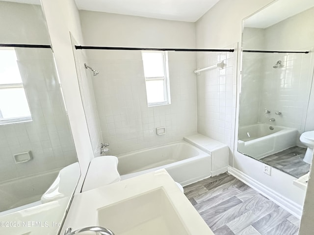 11920 Betula Rd, Jacksonville, FL 32246 - full bath featuring marble finish floor, toilet, and  shower combination
