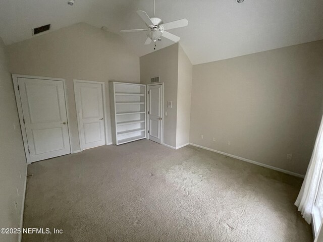 unfurnished bedroom featuring carpet, baseboards, and visible vents