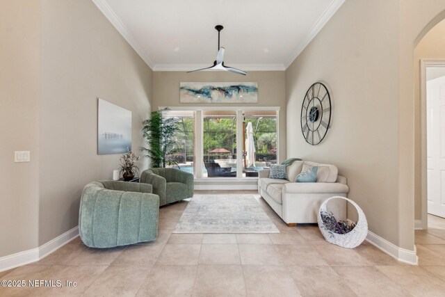 553 S Bridge Creek Dr, Saint Johns, FL 32259 - living area with a ceiling fan, arched walkways, crown molding, and baseboards