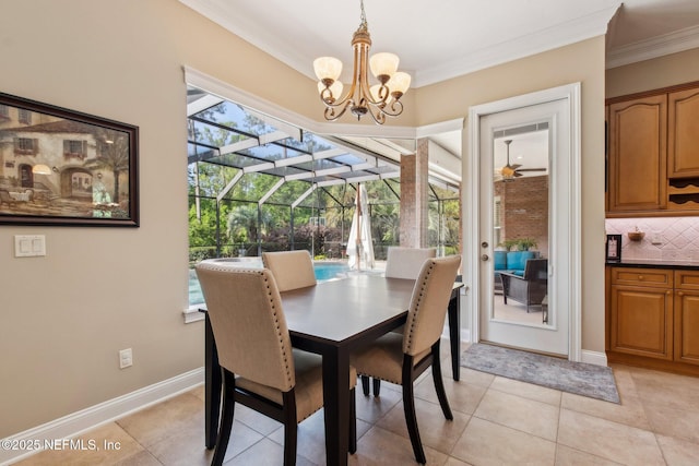 553 S Bridge Creek Dr, Saint Johns, FL 32259 - dining area with light tile patterned flooring, a notable chandelier, crown molding, a sunroom, and baseboards