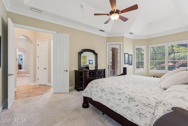 553 S Bridge Creek Dr, Saint Johns, FL 32259 - bedroom featuring arched walkways, ornamental molding, visible vents, and light carpet
