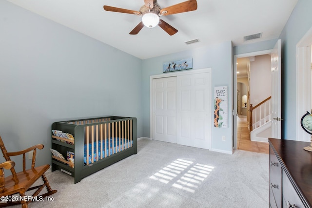 553 S Bridge Creek Dr, Saint Johns, FL 32259 - bedroom with a closet, visible vents, a ceiling fan, and light colored carpet