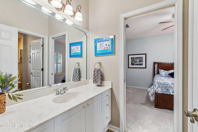 553 S Bridge Creek Dr, Saint Johns, FL 32259 - bathroom featuring baseboards, connected bathroom, visible vents, and vanity