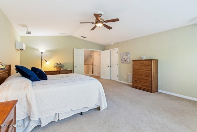 553 S Bridge Creek Dr, Saint Johns, FL 32259 - bedroom featuring visible vents, baseboards, lofted ceiling, an AC wall unit, and light colored carpet
