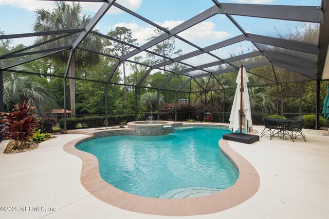 553 S Bridge Creek Dr, Saint Johns, FL 32259 - view of swimming pool featuring glass enclosure, a pool with connected hot tub, and a patio