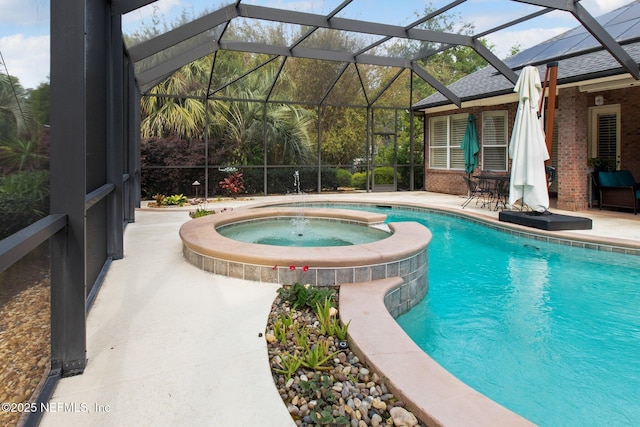 553 S Bridge Creek Dr, Saint Johns, FL 32259 - view of pool featuring a pool with connected hot tub, glass enclosure, and a patio