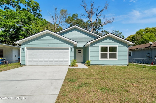 5755 Teeler Ave, Jacksonville, FL 32208 - ranch-style house with a garage and concrete driveway