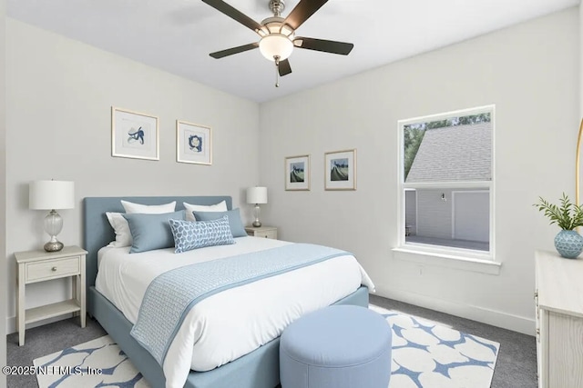 9921 Derby Gate Ct, Jacksonville, FL 32219 - bedroom with carpet flooring, baseboards, and a ceiling fan
