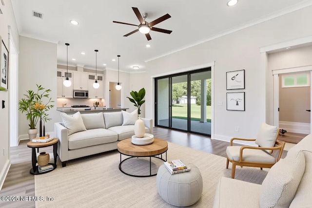 9921 Derby Gate Ct, Jacksonville, FL 32219 - living room featuring light wood-type flooring, a ceiling fan, recessed lighting, and baseboards