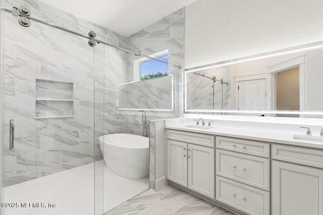 9921 Derby Gate Ct, Jacksonville, FL 32219 - full bath with a stall shower, a soaking tub, marble finish floors, and double vanity