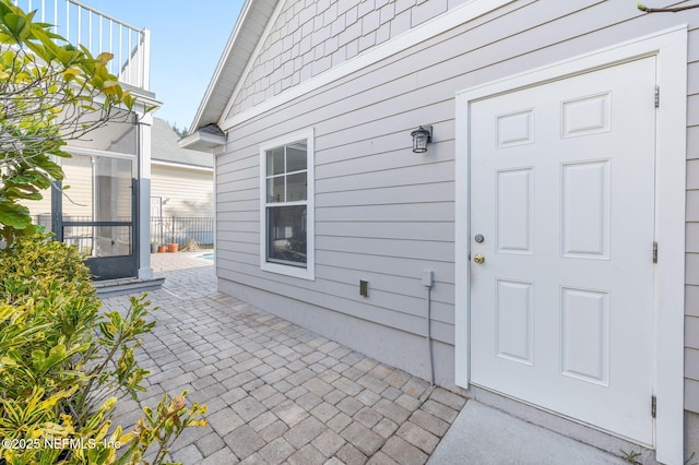 424 High Tide Dr, Saint Augustine, FL 32080 - property entrance with a patio area
