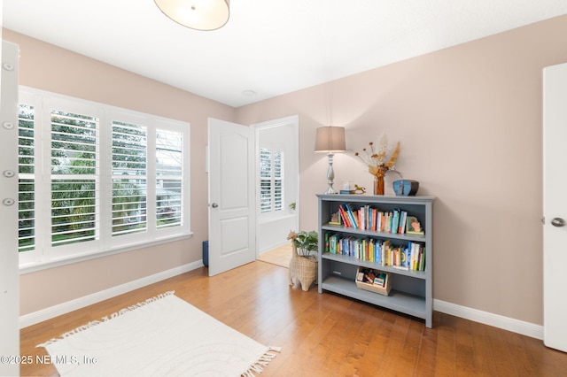 424 High Tide Dr, Saint Augustine, FL 32080 - living area featuring wood finished floors and baseboards