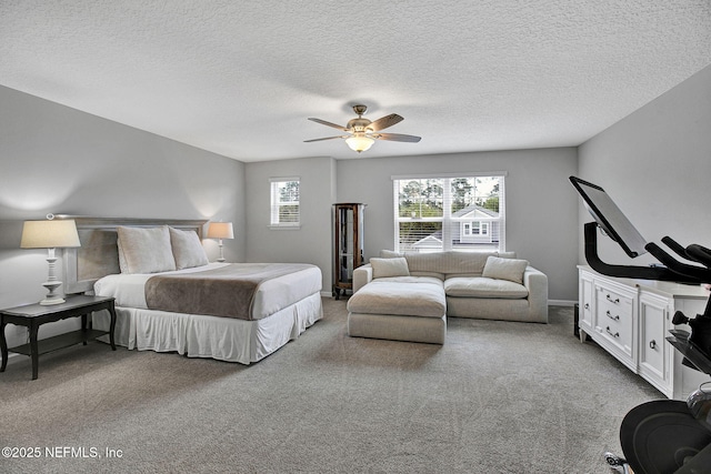 559 Willow Lake Dr, Saint Augustine, FL 32092 - carpeted bedroom featuring ceiling fan and a textured ceiling