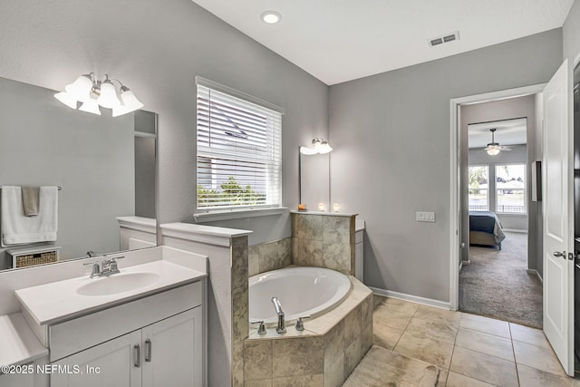 559 Willow Lake Dr, Saint Augustine, FL 32092 - full bathroom with vanity, a garden tub, tile patterned flooring, ensuite bath, and visible vents