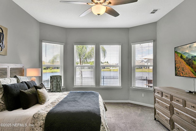 559 Willow Lake Dr, Saint Augustine, FL 32092 - carpeted bedroom featuring baseboards, a textured ceiling, ceiling fan, and visible vents