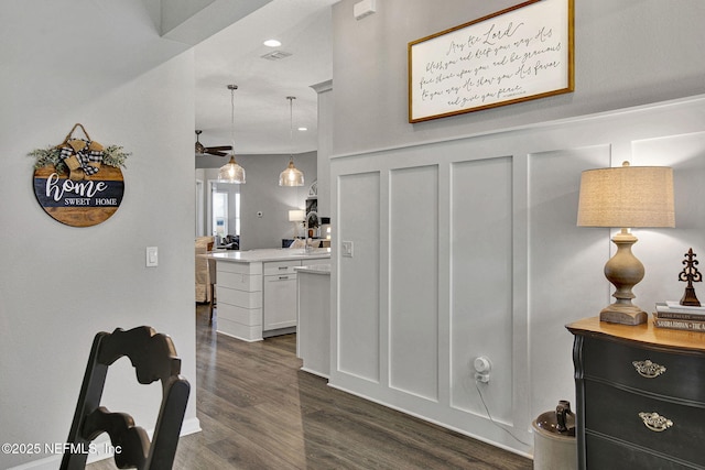 559 Willow Lake Dr, Saint Augustine, FL 32092 - corridor featuring dark wood finished floors, visible vents, and a decorative wall