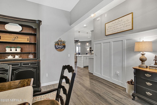 559 Willow Lake Dr, Saint Augustine, FL 32092 - dining room with a decorative wall and wood finished floors