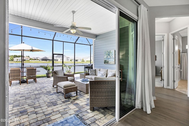 559 Willow Lake Dr, Saint Augustine, FL 32092 - view of patio with an outdoor hangout area, a water view, a ceiling fan, and a lanai