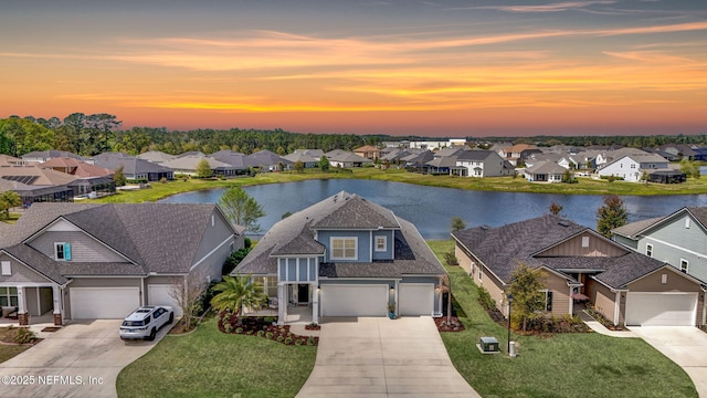559 Willow Lake Dr, Saint Augustine, FL 32092 - view of front of home featuring a water view, a residential view, and driveway
