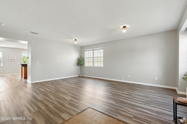 210 Crown Wheel Cir, Saint Johns, FL 32259 - empty room with healthy amount of natural light and wood finished floors