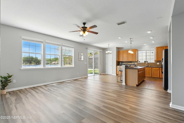 210 Crown Wheel Cir, Saint Johns, FL 32259 - unfurnished living room featuring a ceiling fan, light wood-style flooring, and recessed lighting