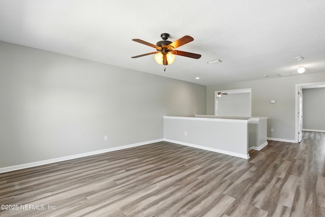 210 Crown Wheel Cir, Saint Johns, FL 32259 - unfurnished room with wood finished floors and a ceiling fan
