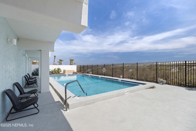 731 1st St S Unit 418, Jacksonville Beach, FL 32250 - pool featuring a fenced backyard and a patio