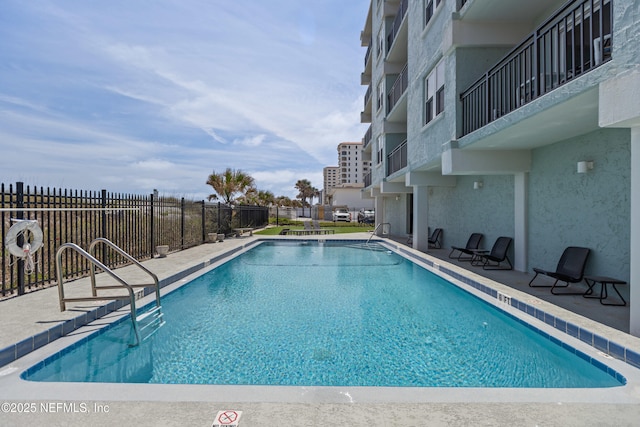 731 1st St S Unit 418, Jacksonville Beach, FL 32250 - community pool with a patio and fence
