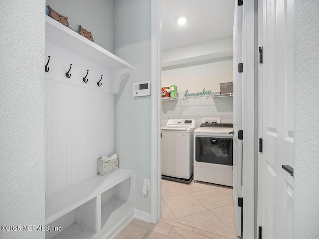 812 Windley Dr, Saint Augustine, FL 32092 - mudroom with washing machine and dryer and light tile patterned floors