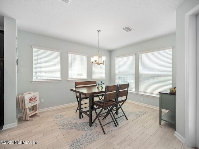 812 Windley Dr, Saint Augustine, FL 32092 - dining space featuring plenty of natural light, visible vents, light wood finished floors, and baseboards