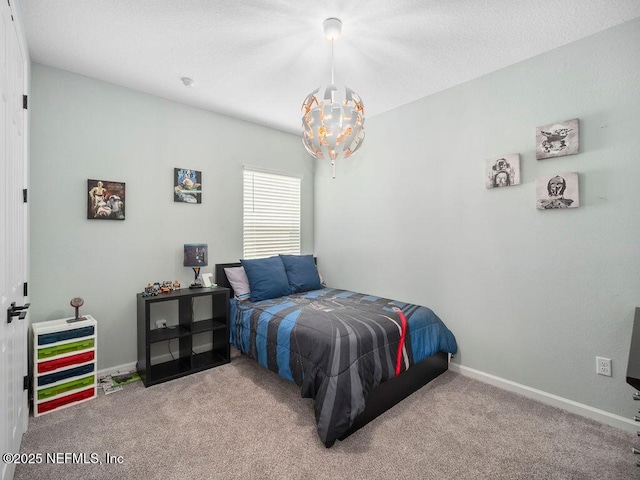 812 Windley Dr, Saint Augustine, FL 32092 - carpeted bedroom with baseboards and a notable chandelier