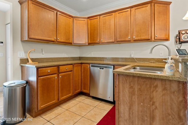 kitchen featuring light tile patterned flooring, brown cabinets, dishwasher, and a sink