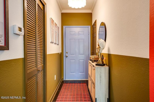 10961 Burnt Mill Rd Unit 321, Jacksonville, FL 32256 - doorway to outside with dark tile patterned flooring, baseboards, and ornamental molding