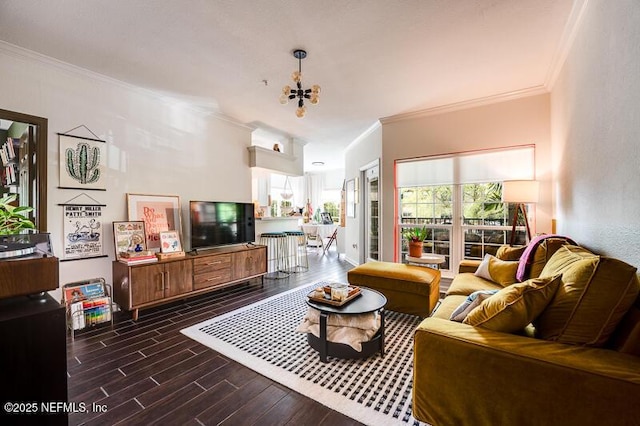 10961 Burnt Mill Rd Unit 321, Jacksonville, FL 32256 - living room featuring dark wood-type flooring, an inviting chandelier, ornamental molding, and a wealth of natural light