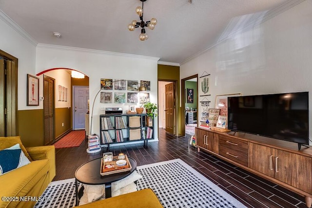 10961 Burnt Mill Rd Unit 321, Jacksonville, FL 32256 - living room featuring arched walkways, a notable chandelier, ornamental molding, and wood tiled floor